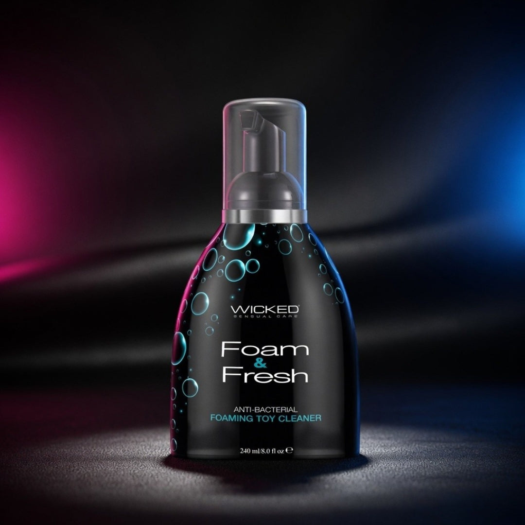 Bottle of Wicked Foam & Fresh toy cleaner on a dark background