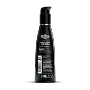 Black bottle with pump dispenser on a white background