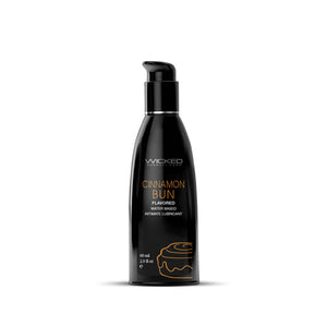 Black bottle of Wicked Strawberry flavored product on a white background