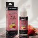 Doc Johnson GoodHead Wet Head Dry Mouth Spray packaging and bottle with pink lemonade flavor on a reflective surface.