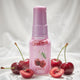 Good Heads Pussy Licker Spray with cherries on a white background