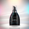 Foam & Fresh toy cleaner bottle with colorful gradient background