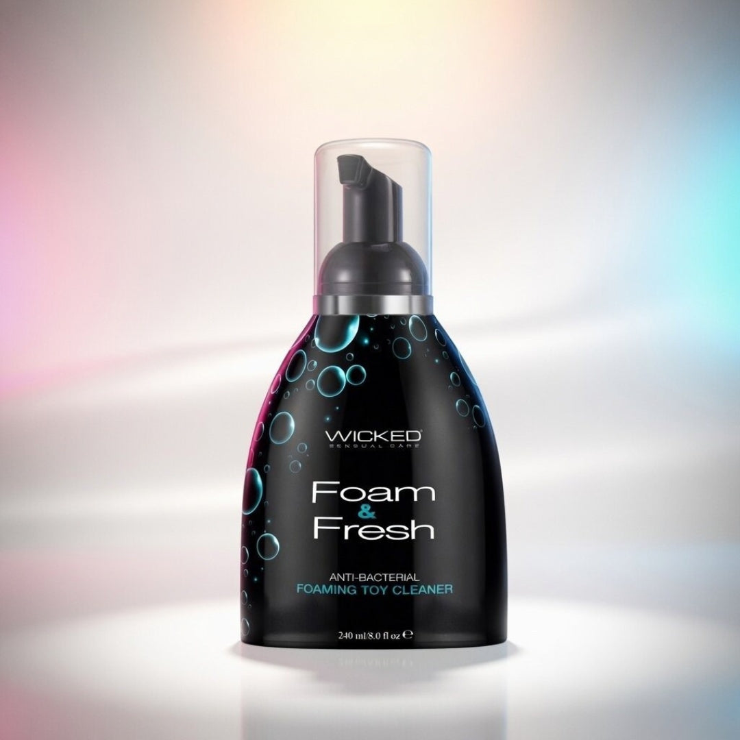 Foam & Fresh toy cleaner bottle with colorful gradient background