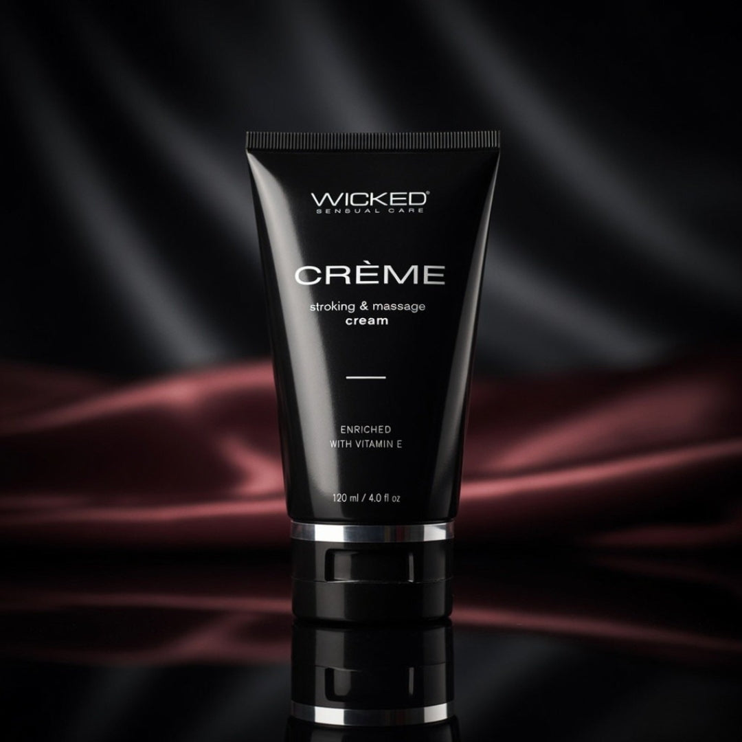 Black tube of Wicked Creme on a dark background
