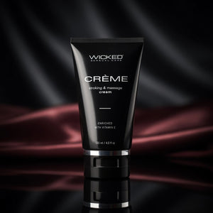 Black tube of Wicked Creme on a dark background