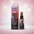 PRO BLO numbing deep-throat spray bottle and packaging on a pink gradient background