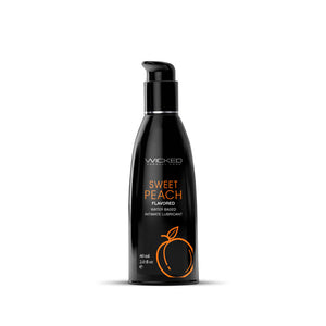 Black bottle of Wicked Sweet Peach lubricant on a white background