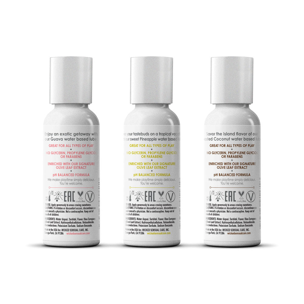 Three white bottles with labels on a white background