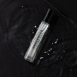 Unscented perfume bottle on a black background