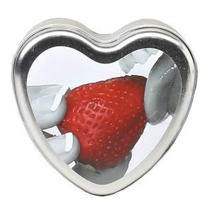 Heart-shaped metal container with a strawberry inside on a white background